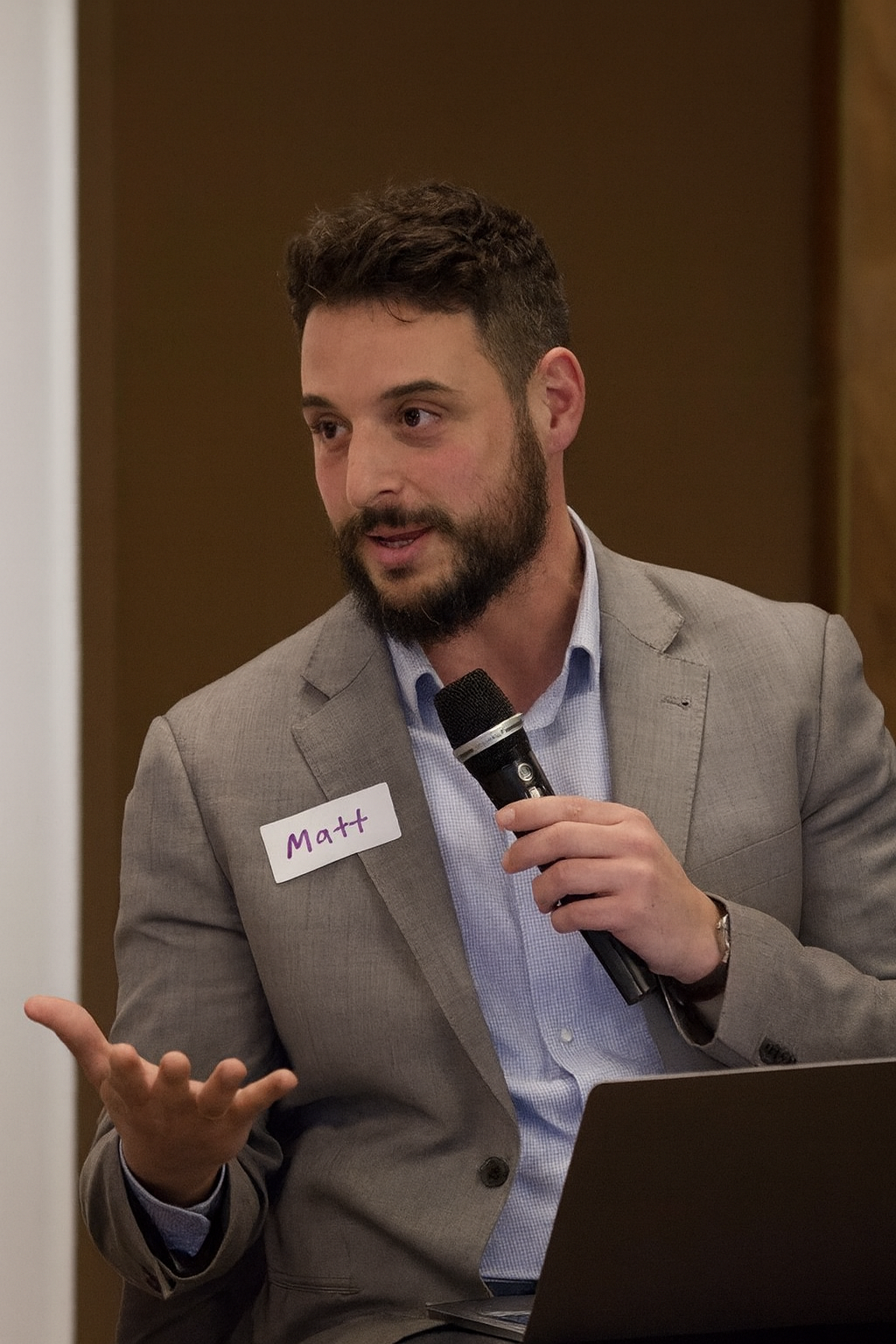 Dr Matthew Iasiello speaking at an event in Melbourne